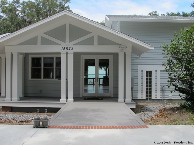 Gable roof porch with no-step entry and glass doors