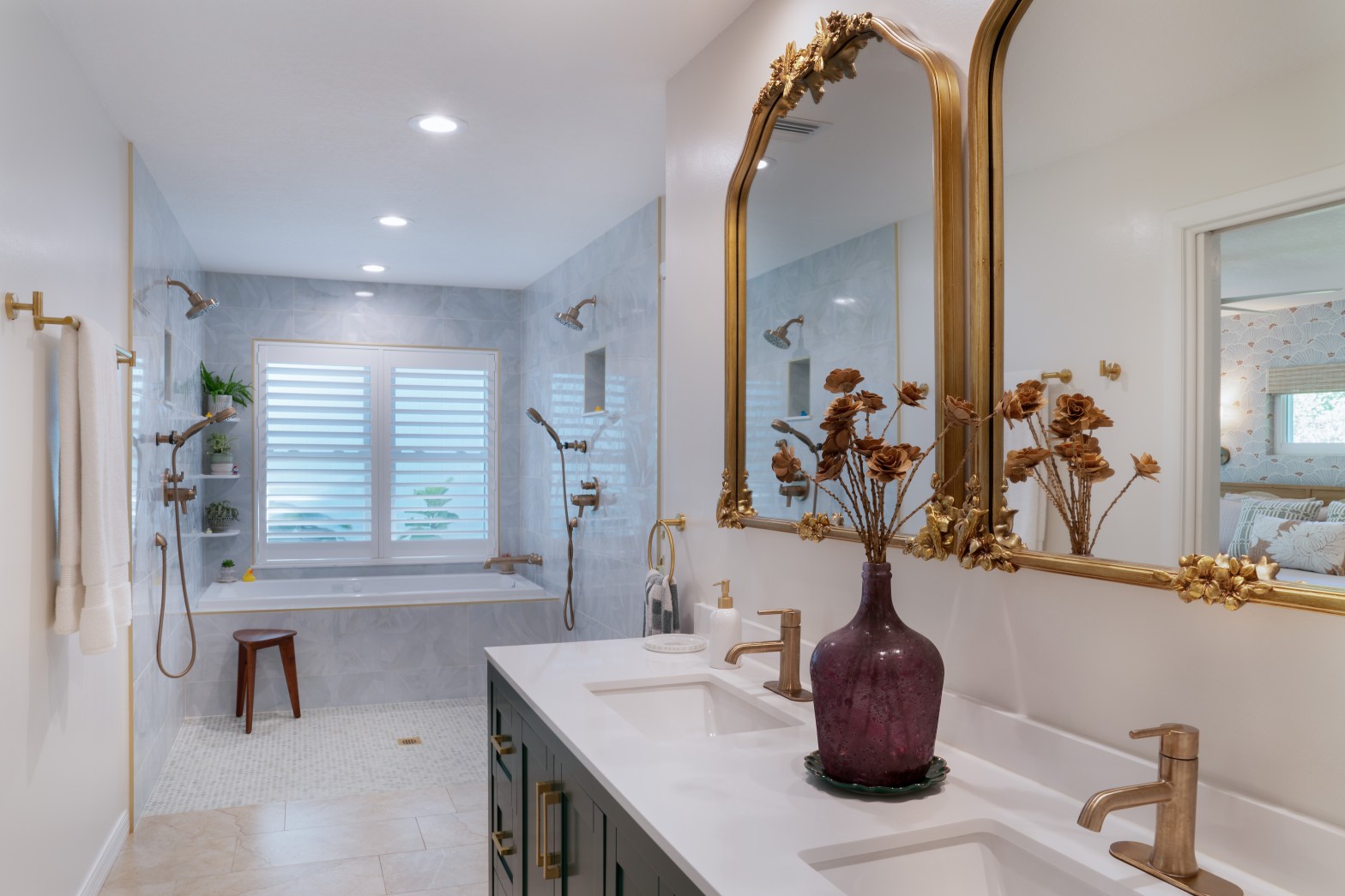 Bathroom addition remodel with dual sinks vanity and spa-like open shower and tub with large window
