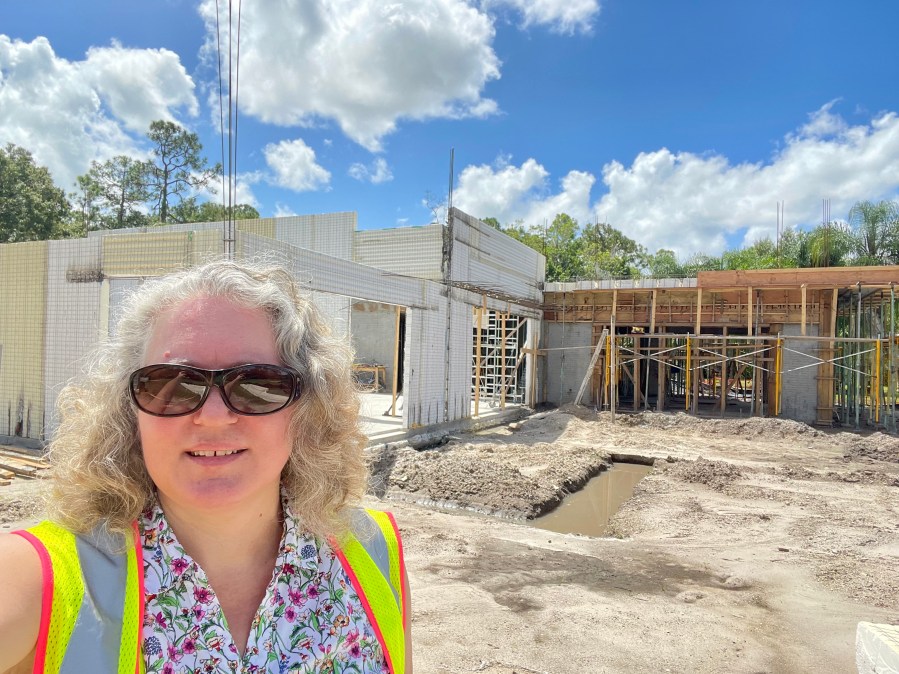 Cathy touring a SCIP home under construction in Sarasota, FL