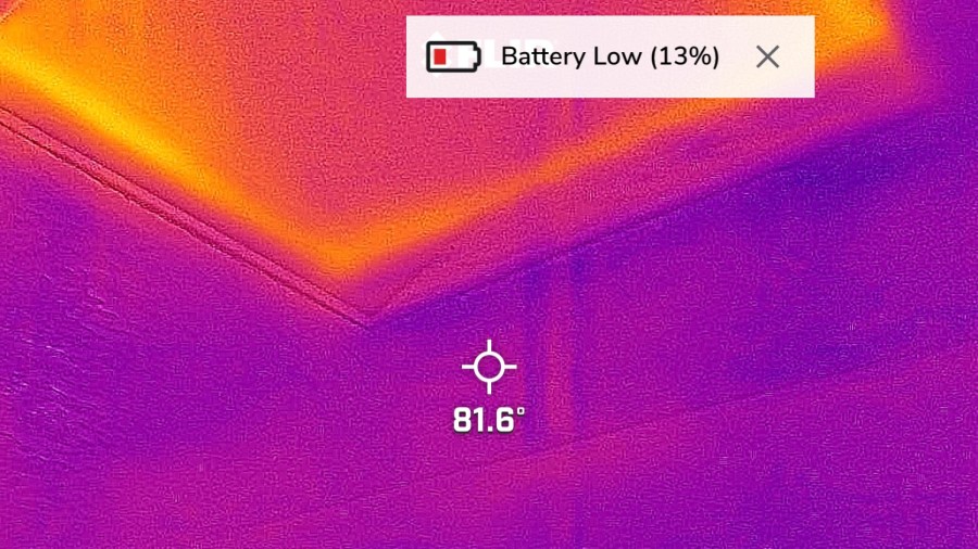 Thermal image of attic access panel showing heat transfer in ceiling